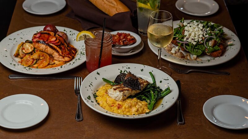 Three entrees with focus on Chesapeake Chicken entree