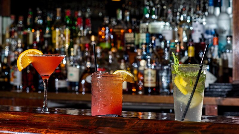 Three different cocktails on bar